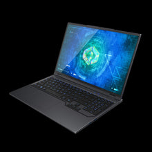 Load image into Gallery viewer, Aftershock APEX 16R laptop angled front-left view with screen on, slim dark-gray chassis and blue-backlit keyboard.