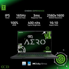 Load image into Gallery viewer, Gigabyte AERO X16 gray laptop front view with screen on, thin bezels, RGB-lit keyboard and display showing "AERO" graphics.